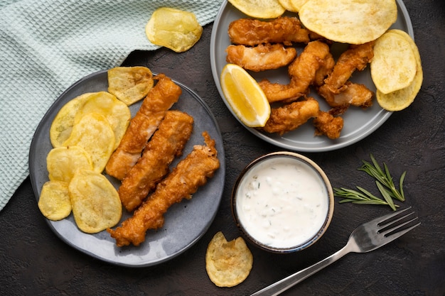 Flat lay of delicious fish and chips concept