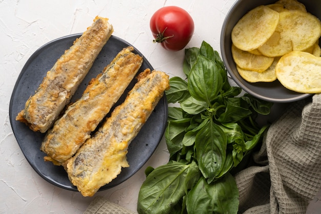 Flat lay of delicious fish and chips concept