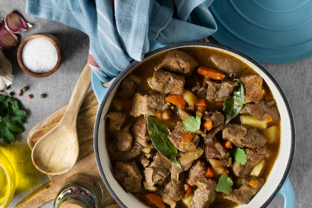 Free Photo flat lay delicious goulash and olive oil