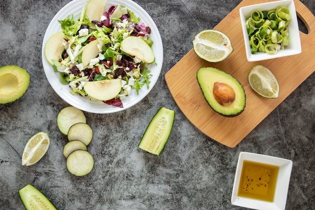 Free photo flat lay delicious salad with avocado