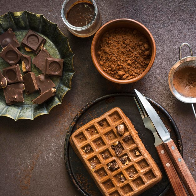 Flat lay of delicious waffers breakfast