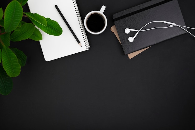 Free Photo flat lay of desk dark concept with copy space