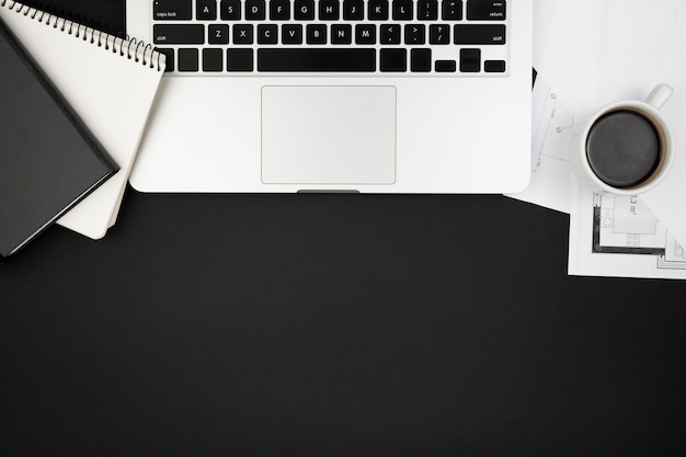 Flat lay of desk dark concept with copy space