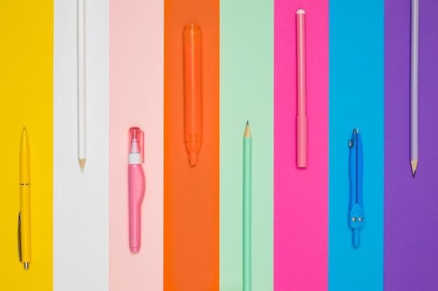 Free photo flat lay of different office pens