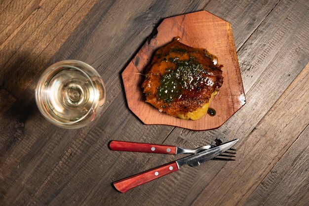 Flat lay dish with white wine