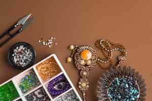 Free photo flat lay of essentials for bead working