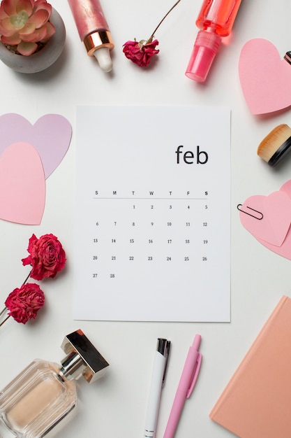 Flat lay february calendar and items