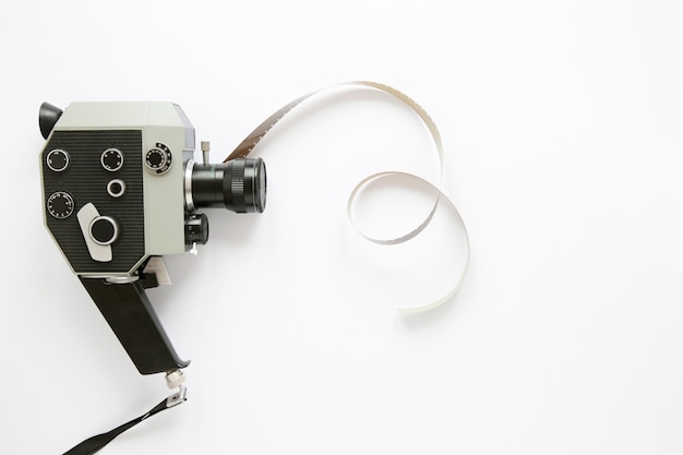 Free Photo flat lay film camera on white background