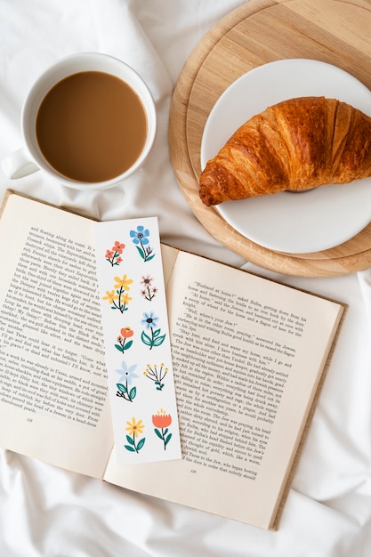 Flat lay floral bookmark on book