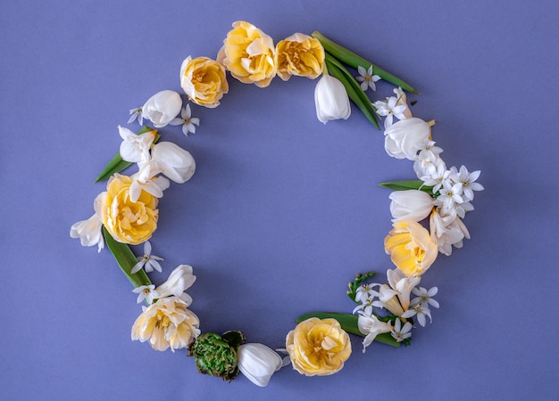 Flat lay flower arrangement on blue background