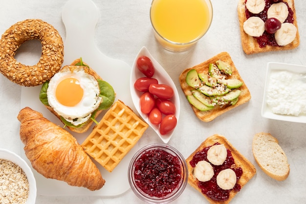 Free photo flat lay frame of breakfast delicacy