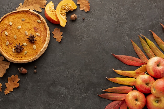 Flat lay frame with apples and pie