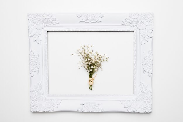 Flat lay of frame with floral concept