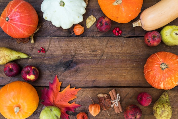 Flat lay frame with pumpkins and copy-space