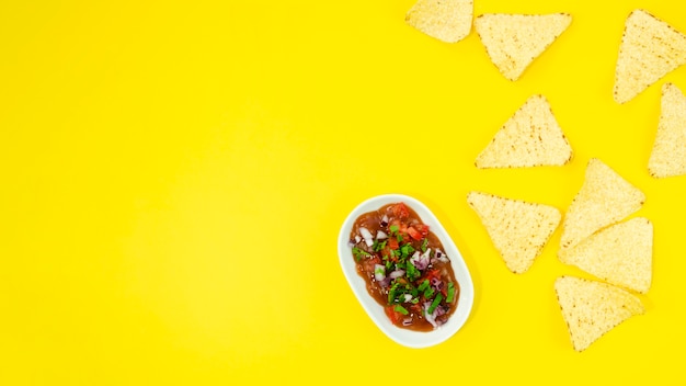 Flat lay frame with tortilla chips and copy-space