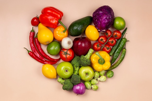 Free photo flat lay fresh fruits and vegetables arrangement