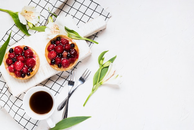 Flat lay fruity cakes assortment