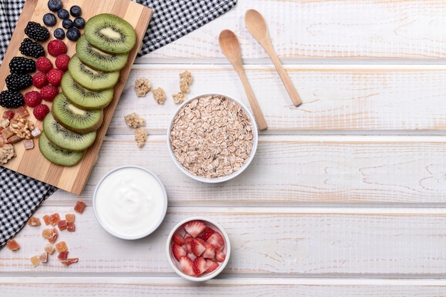 Flat lay fruts with yougurt and granola