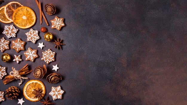 Flat lay of gingerbread cookies and dried citrus for christmas