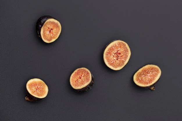 Flat lay of half sliced figs