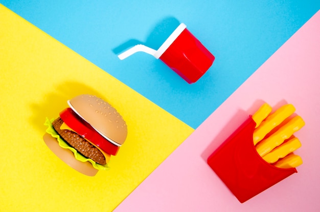 Free photo flat lay of hamburger and fries replicas