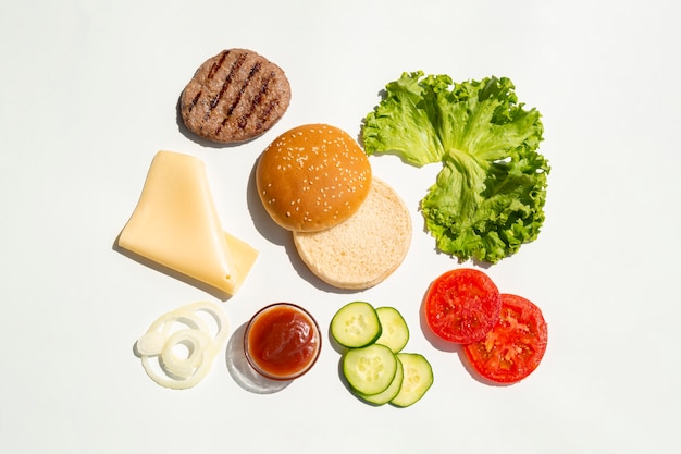 Free photo flat lay of hamburger ingredients