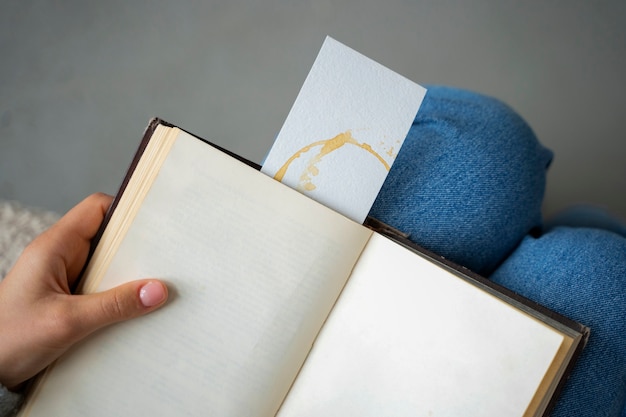 Flat lay hands holding notebook