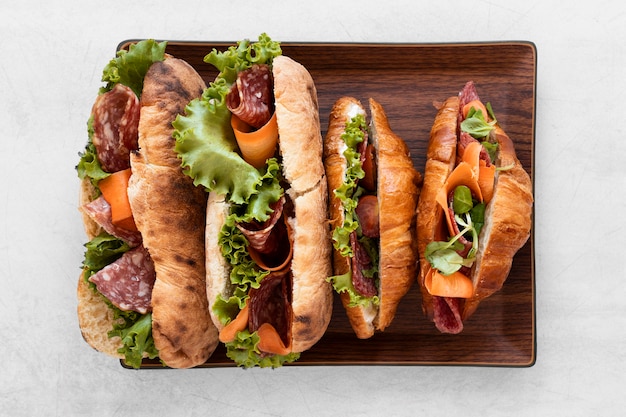 Flat lay healthy sandwiches composition on white background