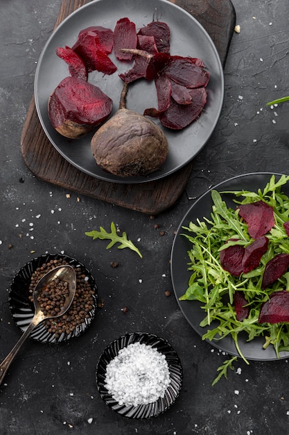 Free photo flat lay homemade salad on dark background