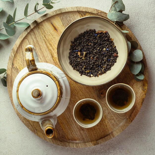 Flat lay hot tea and herbs arrangement