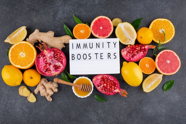 Free Photo flat lay of immunity boosting foods with citrus and ginger