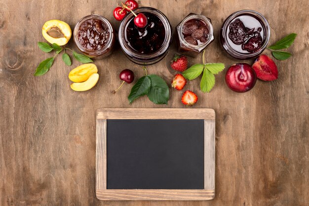 Flat lay jars with stewed fruit