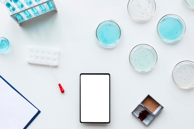 Flat lay  lab equipment and smartphone