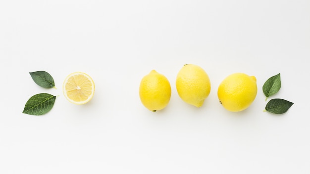 Flat lay of lemon with leaves concept