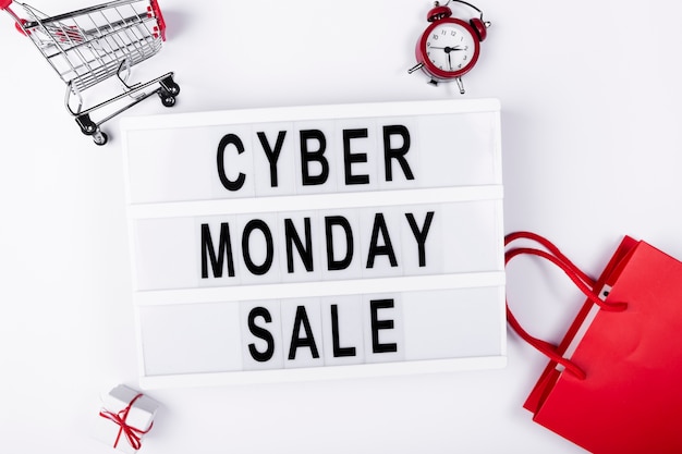 Free photo flat lay light box with cyber monday sale on it