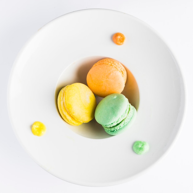 Flat lay macarons in deep plate