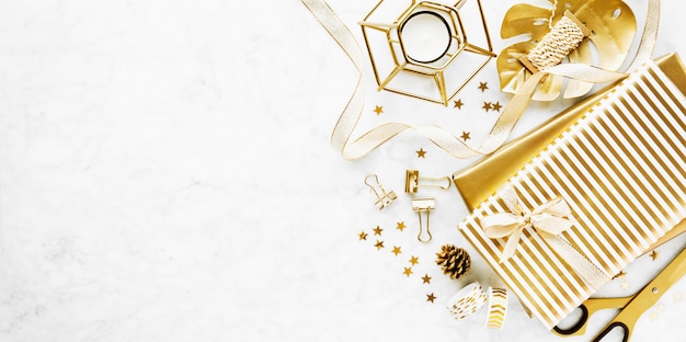 Flat Lay on Marble Background with Golden Deco