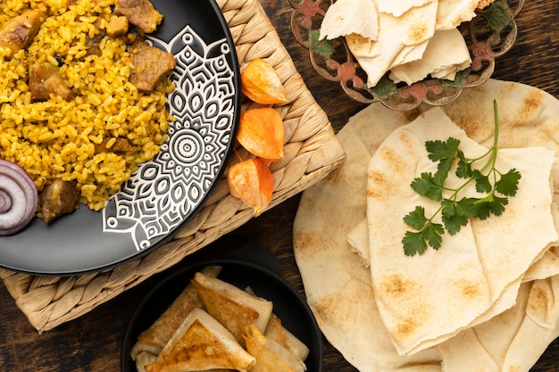 Free photo flat lay meal with rice and pita