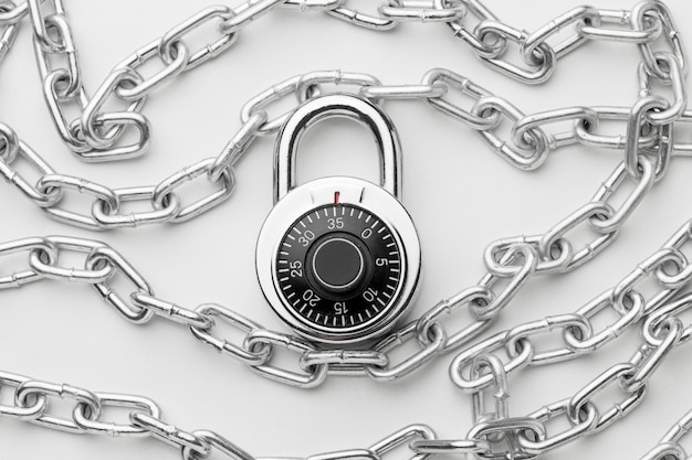 Free Photo flat lay of metal chain with lock