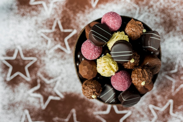 Free photo flat lay mix of candies in bowl