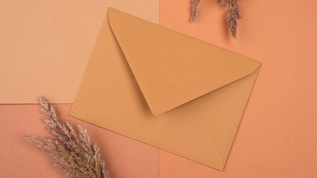 Flat lay of monochromatic dried lavender and envelope