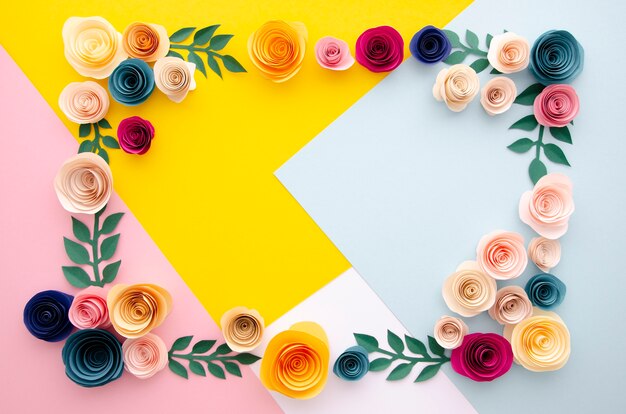 Flat lay multicolored background with flowers frame