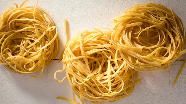 Free Photo flat lay noodles on desk