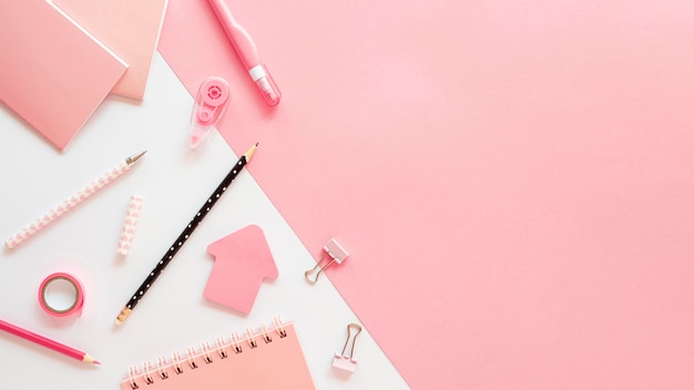 Flat lay of office stationery with copy space and pencils