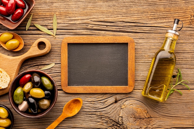 Flat lay olive mix with blackboard mock-up