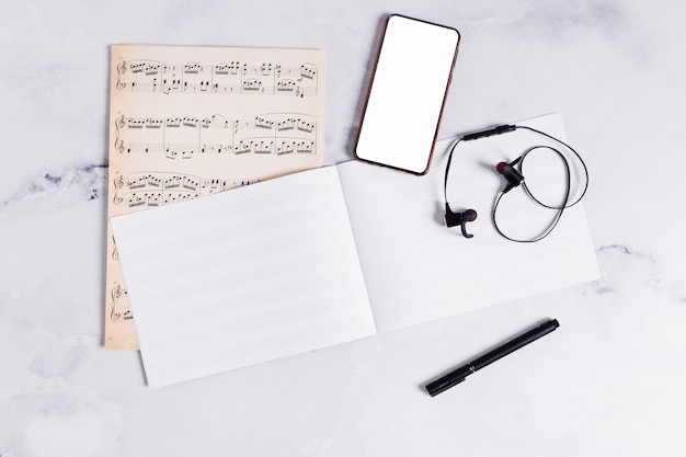 Free photo flat lay of open book for music notes