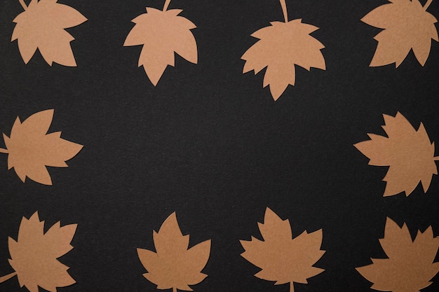 Free photo flat lay paper autumn leaves arrangement with copy space