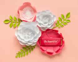 Free photo flat lay of paper flower arrangement for women's day