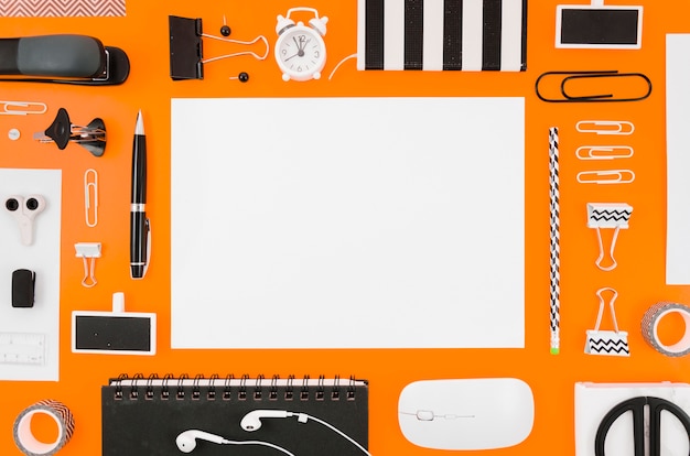 Free Photo flat lay paper mockup with office supplies