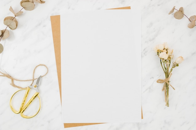 Free Photo flat lay paper mockup on workspace